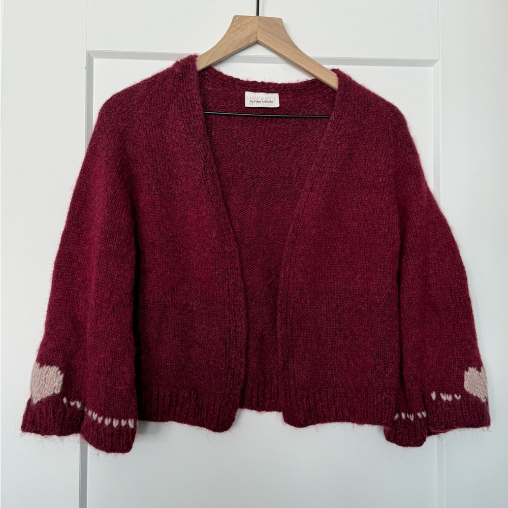Heart on your sleeve hand knitted sweater
